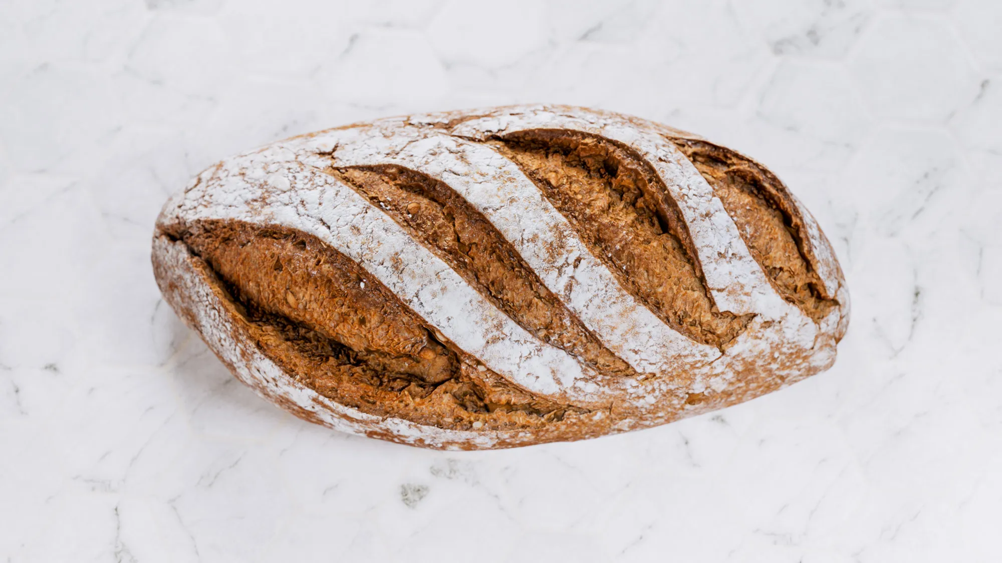 top down view of bread on a white surface