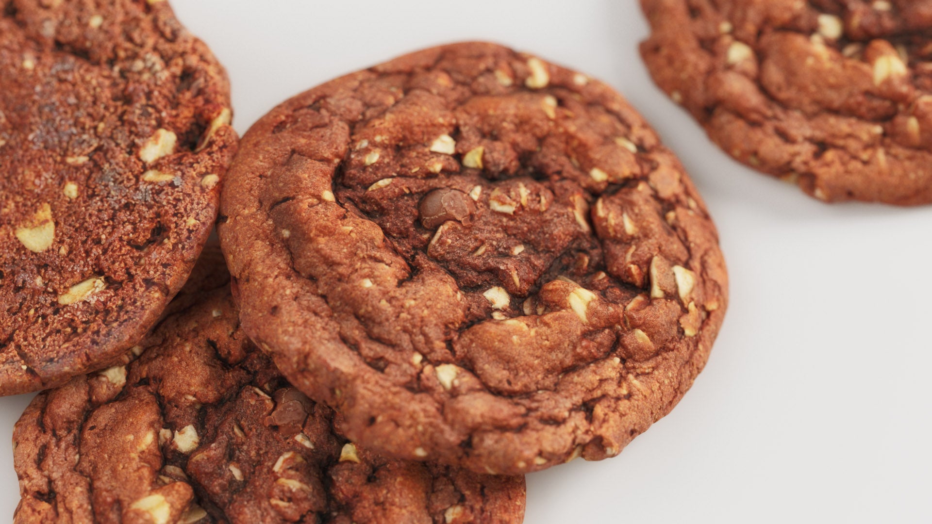 Chocolate chip cookies on a white surface